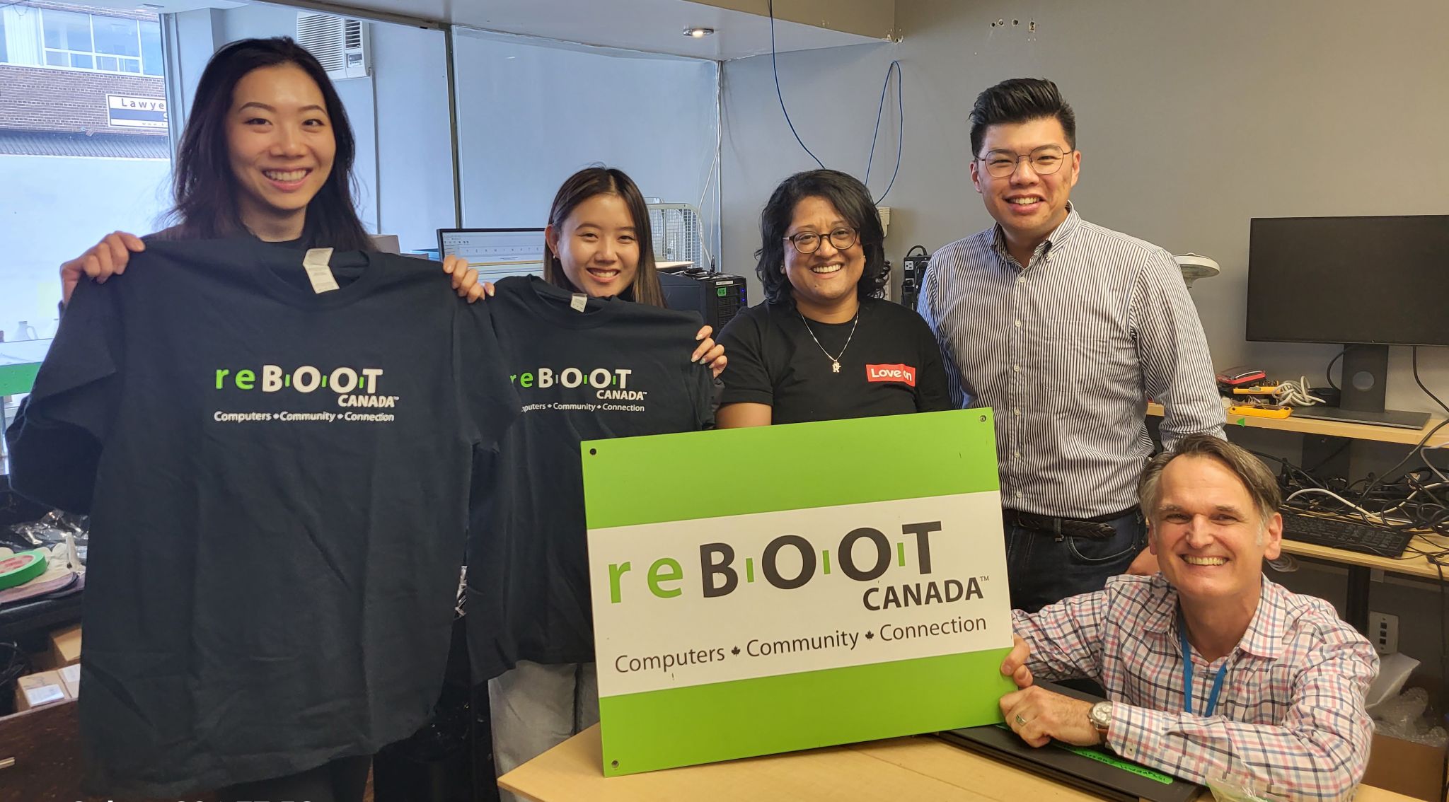 Three members of Lenovo's marketing department pose with Steve Lee and Franc Rota.